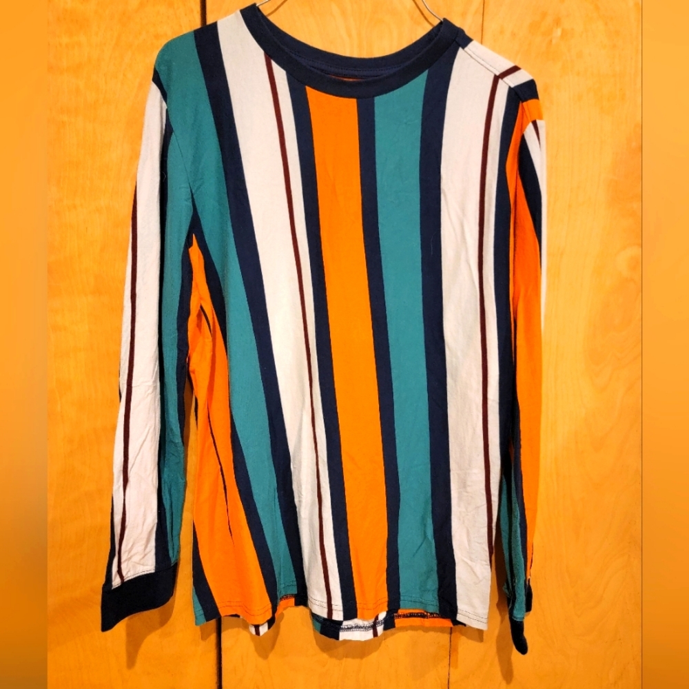 Long sleeved shirt with horizontal stripes running down the entire shirt